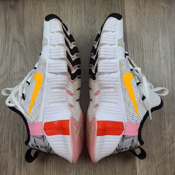 nike training metcon sneakers in white and orange